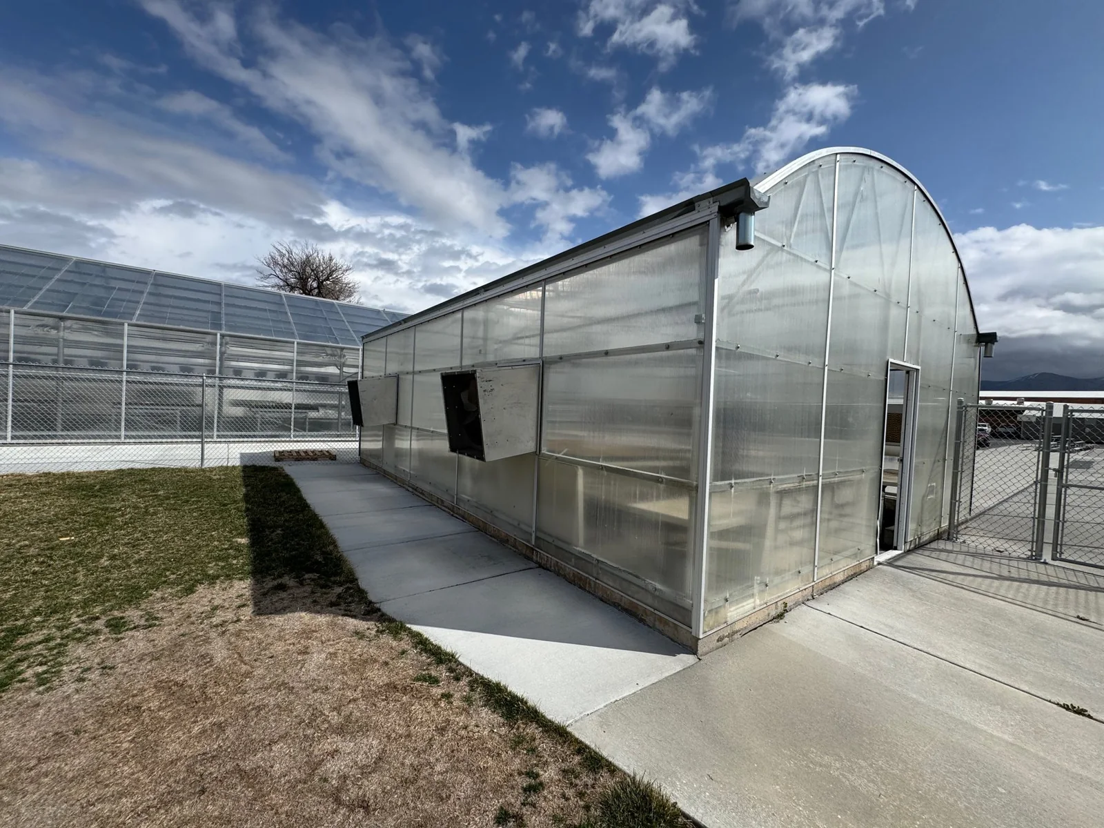 Greenhouse exterior with an arched roof